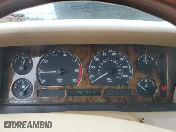 1996 Jaguar XJ with VIN SAJHX1741TC758740, listed as a Copart auction lot 73377914 with 140,964 mi miles and Salvage title. Bid and sale history available at DreamBid. Image 9.