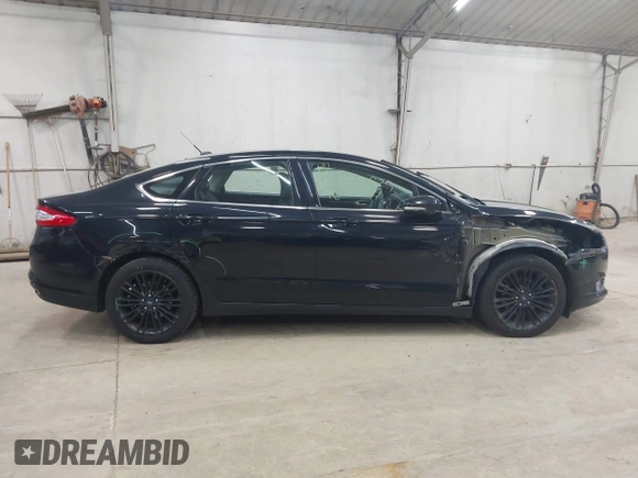 2016 Ford Fusion SE z VIN 3FA6P0T98GR111895, wystawiony jako IAAI lot #42633525 z przebiegiem 77 231 mil mil oraz . Historia ofert i sprzedaży dostępna na DreamBid. Obrazek 14.