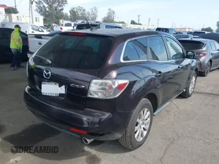2011 Mazda CX-7 i Touring with VIN JM3ER2CM0B0402889, listed as a IAAI auction lot 42040829 with 134,836 mi miles. Bid and sale history available at carsss.com. Image 4.