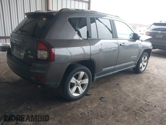 2016 Jeep Compass Latitude with VIN 1C4NJCEA2GD599833, listed as a IAAI auction lot 41507729 with 107,187 mi miles. Bid and sale history available at carsss.com. Image 4.