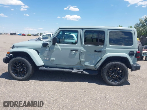 2023 Jeep Wrangler Sahara with VIN 1C4JJXP68PW627007, listed as a IAAI auction lot 42474745 with 57,912 mi miles and . Bid and sale history available at DreamBid. Image 14.