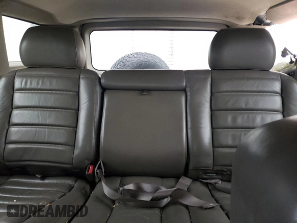 2003 Hummer H2 with VIN 5GRGN23U43H128269, listed as a Copart auction lot 47992444 with 153,360 mi miles and Salvage Title. Bid and sale history available at carsss.com. Image 10.