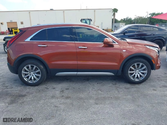 2019 Cadillac XT4 FWD Premium Luxury with VIN 1GYFZCR41KF183507, listed as a IAAI auction lot 41987176 with 64,803 mi miles. Bid and sale history available at carsss.com. Image 13.