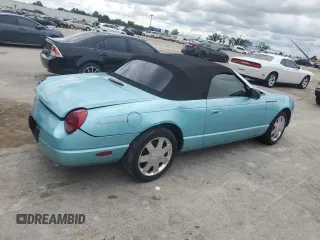 2002 Ford Thunderbird Hardtop Premium z VIN 1FAHP60A62Y128330, wystawiony jako Copart lot #71269834 z przebiegiem 96 182 mil mil oraz Szkoda całkowita • Salvage title. Historia ofert i sprzedaży dostępna na DreamBid. Obrazek 3.