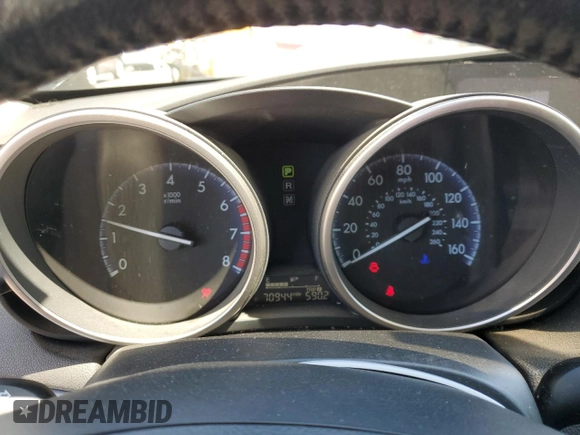 2012 Mazda 3 S Touring with VIN JM1BL1L69C1512876, listed as a Copart auction lot 69316034 with 70,944 mi miles and Salvage Title. Bid and sale history available at DreamBid. Image 9.