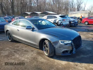 2014 Audi A5 Premium Plus with VIN WAULFAFR3EA023911, listed as a IAAI auction lot 41348496 with 97,099 mi miles and . Bid and sale history available at DreamBid. Image 1.