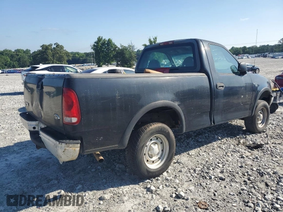 2000 Ford F-150 XL with VIN 1FTRF18W9YNB95521, listed as a Copart auction lot 57720434 with 203,143 mi miles and Clean title. Bid and sale history available at DreamBid. Image 3.