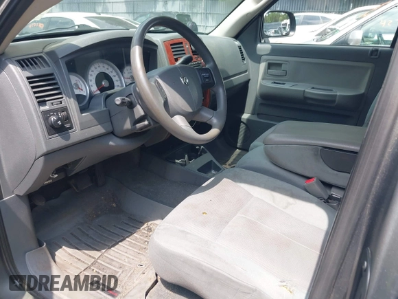 2005 Dodge Dakota SLT with VIN 1D7HW42N25S155393, listed as a IAAI auction lot 42727690 with 230,042 mi miles and . Bid and sale history available at DreamBid. Image 8.