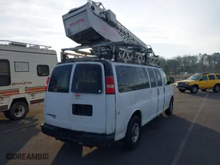 2013 Chevrolet Express Passenger LT with VIN 1GAZG1FG1D1159390, listed as a IAAI auction lot 41191409 with 176,899 mi miles. Bid and sale history available at carsss.com. Image 4.
