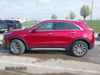 2019 Cadillac XT4 FWD Premium Luxury with VIN 1GYFZCR45KF125884, listed as a IAAI auction lot 41905282 with 68,470 mi miles. Bid and sale history available at carsss.com. Image 14.