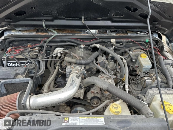 2008 Jeep Wrangler X with VIN 1J4FA24168L582227, listed as a Copart auction lot 58219065 with 98,284 mi miles and Salvage title. Bid and sale history available at DreamBid. Image 7.