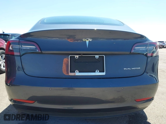 2019 Tesla Model 3 Long Range with VIN 5YJ3E1EB9KF386047, listed as a IAAI auction lot 42215362 with 41,246 mi miles and . Bid and sale history available at DreamBid. Image 17.