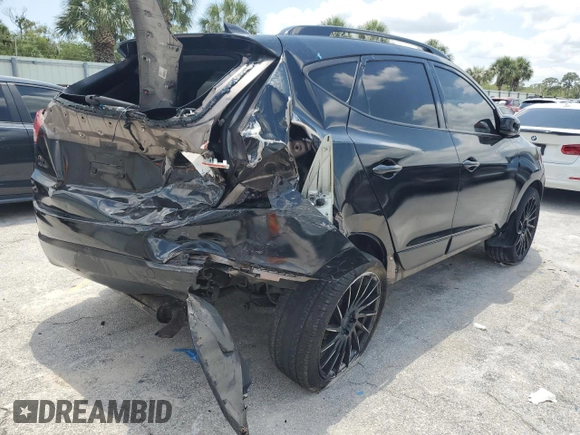 2010 Hyundai Tucson GLS with VIN KM8JU3AC2AU079129, listed as a Copart auction lot 54312875 with 116,659 mi miles and Salvage Title. Bid and sale history available at DreamBid. Image 3.