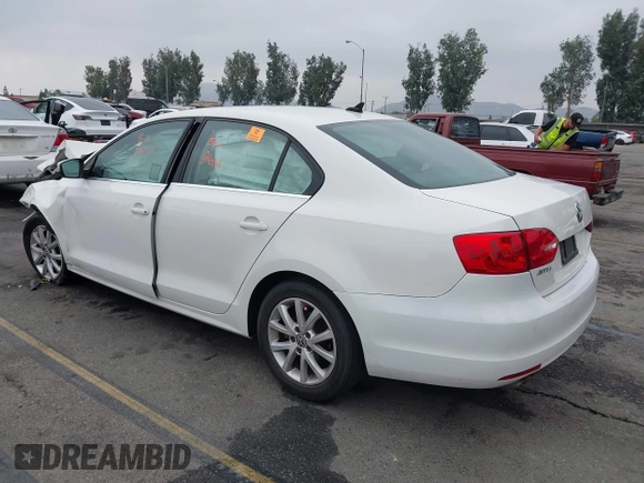 2013 Volkswagen Jetta SE with VIN 3VWDP7AJXDM432740, listed as a IAAI auction lot 42569834 with 118,659 mi miles and . Bid and sale history available at DreamBid. Image 3.