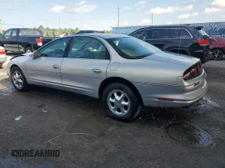 1997 Oldsmobile Aurora with VIN 1G3GR62C0V4102252, listed as a Copart auction lot 53270245 with 123,615 mi miles and Salvage Title. Bid and sale history available at DreamBid. Image 2.