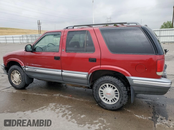 1997 GMC Jimmy SLS with VIN 1GKDT13W8V2515536, listed as a Copart auction lot 66701094 with 123,051 mi miles and Salvage Title. Bid and sale history available at carsss.com. Image 2.