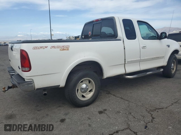 2001 Ford F-150 XL z VIN 1FTRX18L21NA29205, wystawiony jako Copart lot #58928795 z przebiegiem Nie podano mil oraz Szkoda całkowita • Salvage title. Historia ofert i sprzedaży dostępna na DreamBid. Obrazek 3.