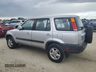 1999 Honda CR-V EX with VIN JHLRD1865XC064542, listed as a Copart auction lot 74730634 with 71,298 mi miles and Salvage Title. Bid and sale history available at carsss.com. Image 2.