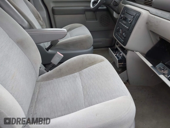 2006 Ford Freestar SE z VIN 2FMZA51686BA08208, wystawiony jako IAAI lot #41950430 z przebiegiem Nie podano mil oraz . Historia ofert i sprzedaży dostępna na DreamBid. Obrazek 5.