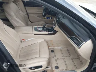 2016 BMW 7 Series 750i xDrive with VIN WBA7F2C58GG418482, listed as a IAAI auction lot 41931831 with 97,776 mi miles and . Bid and sale history available at DreamBid. Image 5.