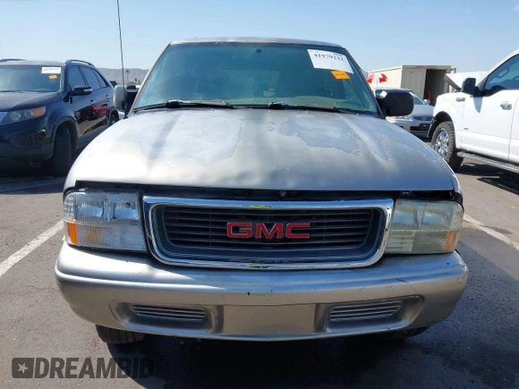 1999 GMC Jimmy SLE with VIN 1GKDT13W5X2539067, listed as a IAAI auction lot 41979222 with 1 mi miles. Bid and sale history available at carsss.com. Image 6.