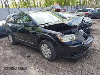 2017 Dodge Journey SE z VIN 3C4PDCAB6HT697631, wystawiony jako IAAI lot #42200146 z przebiegiem 158 511 mil mil oraz . Historia ofert i sprzedaży dostępna na DreamBid. Obrazek 1.