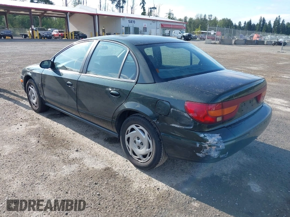 2000 Saturn SL z VIN 1G8ZK5271YZ165467, wystawiony jako IAAI lot #42367156 z przebiegiem 185 962 mil mil oraz . Historia ofert i sprzedaży dostępna na DreamBid. Obrazek 3.
