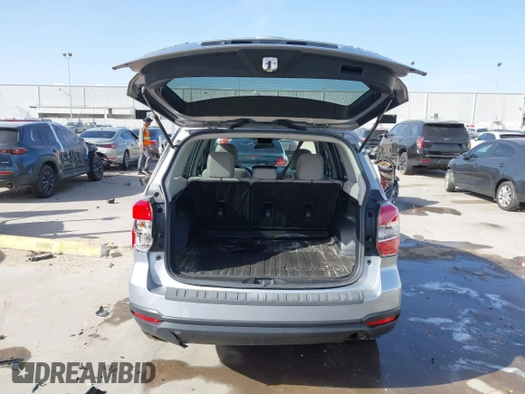 2016 Subaru Forester 2.5i Premium with VIN JF2SJADC8GH549569, listed as a IAAI auction lot 41828984 with 96,413 mi miles. Bid and sale history available at carsss.com. Image 18.