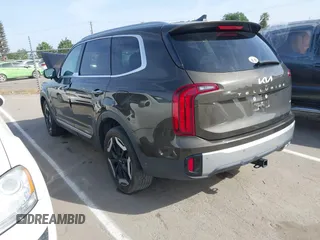 2023 Kia Telluride S with VIN 5XYP6DGC0PG334800, listed as a IAAI auction lot 42078611 with 27,486 mi miles and . Bid and sale history available at DreamBid. Image 3.