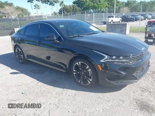 2023 Kia K5 GT-Line z VIN 5XXG64J29PG179376, wystawiony jako IAAI lot #41733024 z przebiegiem 58 832 mil mil oraz . Historia ofert i sprzedaży dostępna na DreamBid. Obrazek 1.