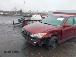 2004 Toyota Camry LE with VIN 4T1BE32K04U314445, listed as a IAAI auction lot 42017413 with 137,702 mi miles. Bid and sale history available at carsss.com. Image 6.