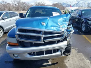 2003 Dodge Dakota SLT with VIN 1D7HL48N73S333828, listed as a IAAI auction lot 41748642 with 163,258 mi miles. Bid and sale history available at carsss.com. Image 12.