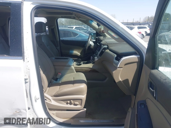 2017 GMC Yukon SLT with VIN 1GKS1BKC9HR278190, listed as a IAAI auction lot 41824213 with 104,323 mi miles. Bid and sale history available at carsss.com. Image 5.