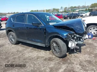 2020 Mazda CX-5 Touring with VIN JM3KFBCM7L0750217, listed as a IAAI auction lot 41930065 with 92,570 mi miles and . Bid and sale history available at DreamBid. Image 1.