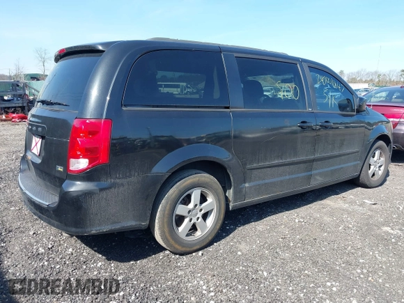 2013 Dodge Grand Caravan SXT with VIN 2C4RDGCG1DR626827, listed as a IAAI auction lot 38984754 with 224,487 mi miles and . Bid and sale history available at DreamBid. Image 4.