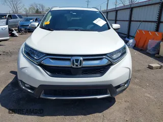 2018 Honda CR-V Touring with VIN 2HKRW2H93JH686298, listed as a IAAI auction lot 41979786 with 100,087 mi miles. Bid and sale history available at carsss.com. Image 12.