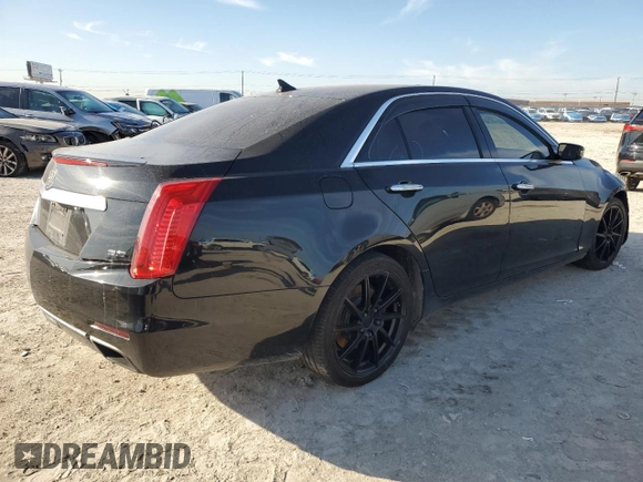 2014 Cadillac CTS Premium AWD с VIN 1G6AZ5S35E0159783, выставлен на аукционе Copart как лот 87081994 с пробегом 116 972 миль миль и Списание • Salvage title. История ставок и продаж доступна на DreamBid. Изображение 3.