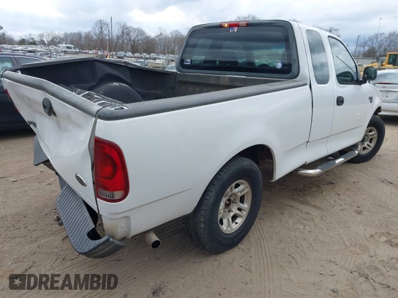 2003 Ford F-150 XL with VIN 1FTRX17W23NA71890, listed as a IAAI auction lot 41716266 with 1 mi miles. Bid and sale history available at carsss.com. Image 4.