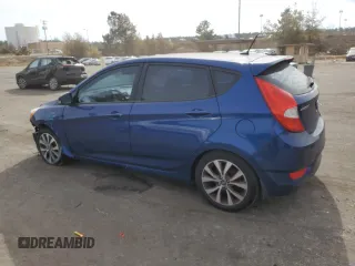 2015 Hyundai Accent Sport with VIN KMHCU5AE6FU205862, listed as a Copart auction lot 45938984 with 110,651 mi miles and Salvage Title. Bid and sale history available at carsss.com. Image 2.