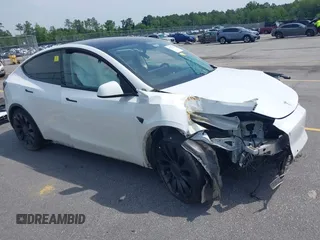 2022 Tesla Model Y Performance z VIN 7SAYGDEFXNF327701, wystawiony jako IAAI lot #42277827 z przebiegiem 25 mil mil oraz . Historia ofert i sprzedaży dostępna na DreamBid. Obrazek 1.