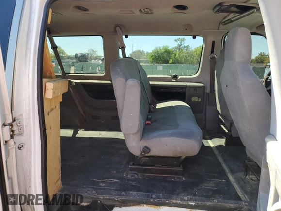 2012 Ford Econoline Passenger XL with VIN 1FBSS3BS8CDB20584, listed as a Copart auction lot 49483935 with 176,388 mi miles and Salvage Title. Bid and sale history available at DreamBid. Image 11.