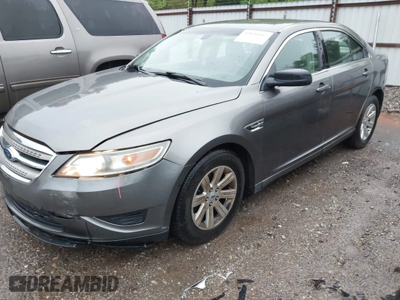 2011 Ford Taurus SE with VIN 1FAHP2DW2BG181059, listed as a IAAI auction lot 42036867 with 103,394 mi miles. Bid and sale history available at carsss.com. Image 2.