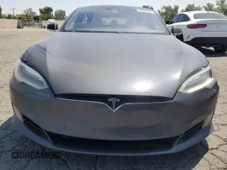 2016 Tesla Model S 90D с VIN 5YJSA1E23GF150718, выставлен на аукционе Copart как лот 58328045 с пробегом 171 496 миль миль и Списание • Salvage title. История ставок и продаж доступна на DreamBid. Изображение 5.