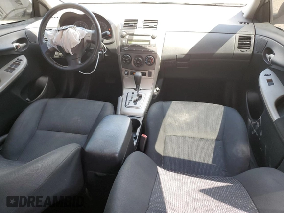 2010 Toyota Corolla with VIN 2T1BU4EE8AC427717, listed as a Copart auction lot 57528435 with 142,826 mi miles and Salvage title. Bid and sale history available at DreamBid. Image 8.