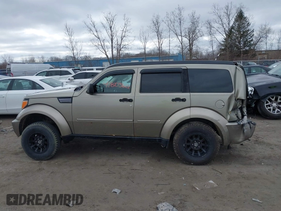 2007 Dodge Nitro SLT z VIN 1D8GU58K97W700047, wystawiony jako IAAI lot #41805822 z przebiegiem 186 604 mil mil oraz . Historia ofert i sprzedaży dostępna na DreamBid. Obrazek 13.