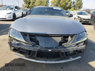 2021 Toyota GR Supra 3.0 with VIN WZ1DB0C04MW034647, listed as a Copart auction lot 73430074 with 68,910 mi miles and Salvage Title. Bid and sale history available at carsss.com. Image 5.
