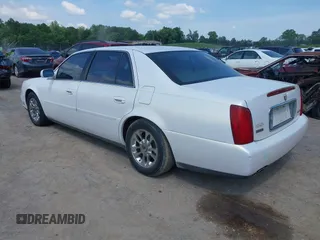 2004 Cadillac DeVille z VIN 1G6KD54Y04U156194, wystawiony jako IAAI lot #42143148 z przebiegiem 141 938 mil mil oraz . Historia ofert i sprzedaży dostępna na DreamBid. Obrazek 3.