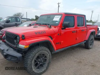 2024 Jeep Gladiator Sport with VIN 1C6HJTAG5RL101616, listed as a IAAI auction lot 42156992 with 31,824 mi miles and . Bid and sale history available at DreamBid. Image 2.