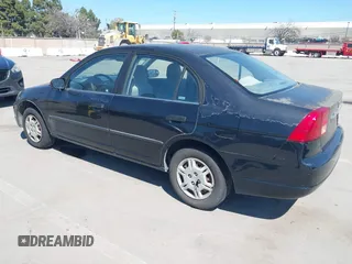 2001 Honda Civic DX with VIN 2HGES15241H573417, listed as a IAAI auction lot 41890215 with 335,619 mi miles. Bid and sale history available at carsss.com. Image 3.