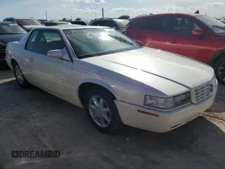 2001 Cadillac Eldorado Touring ETC z VIN 1G6ET12941B101128, wystawiony jako Copart lot #73832624 z przebiegiem Nie podano mil oraz Nie do naprawy. Historia ofert i sprzedaży dostępna na DreamBid. Obrazek 4.